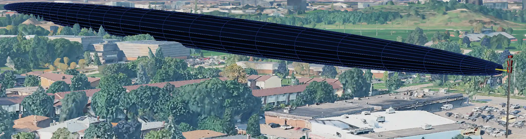 Google Earth view showing a 3D Fresnel zone wireframe and yellow line of sight over coastal terrain